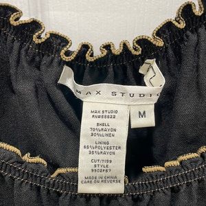 Max Studio Dress in navy blue with gold embroidery.